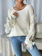 Fashionable bow details hollowed out raglan sleeves knit sweater round neck minimalist sweater