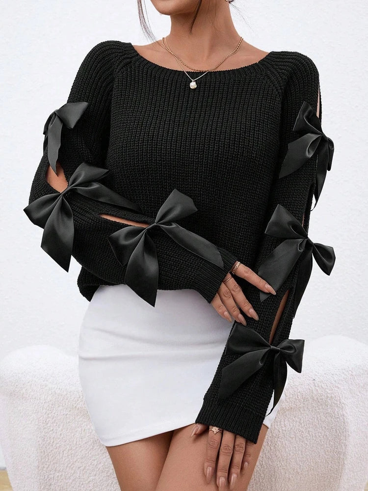 Fashionable bow details hollowed out raglan sleeves knit sweater round neck minimalist sweater